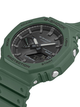 Angle shot of Casio G-Shock GA-B2100-3AER Black Dial Green Resin Mens Watch on white background