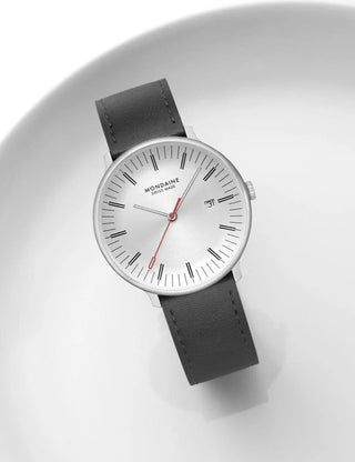 Angle shot of Mondaine MLE.41210.LBV Silver Dial Black Leather Unisex Watch on white background