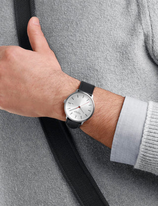 Angle shot of Mondaine MLE.41210.LBV Silver Dial Black Leather Unisex Watch on white background
