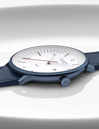 Angle shot of Mondaine MLE.41910.LQV White Dial Blue Leather Unisex Watch on white background