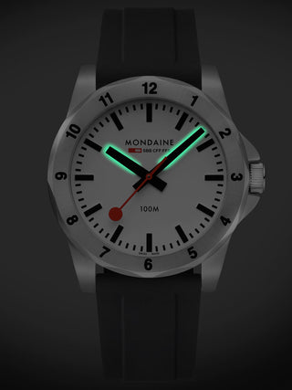 Angle shot of Mondaine MSN.4211B.RB White Dial Black Silicone Unisex Watch on white background