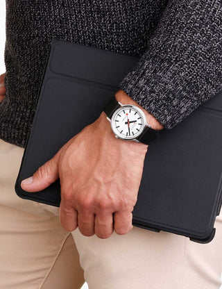 Angle shot of Mondaine MST.4161B.LBV White Dial Black Leather Unisex Watch on white background