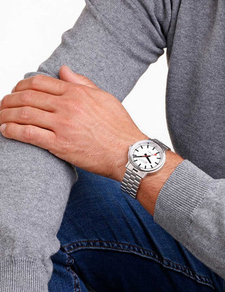 Angle shot of Mondaine MST.4161B.SJ White Dial Silver Stainless Steel Unisex Watch on white background