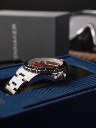 Angle shot of Spinnaker SP-5136-44 Red Dial Silver Stainless Steel Unisex Watch on white background