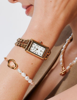 Angle shot of Thomas Sabo WA0429-291-207 White Dial Gold Stainless Steel Womens Watch on white background