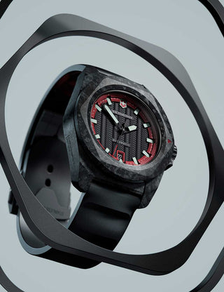Angle shot of Victorinox 242024.1 Red Dial Black Strap Unisex Watch on white background