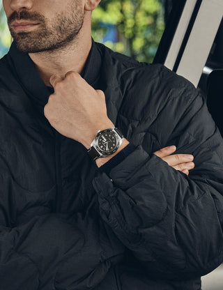 Angle shot of Victorinox 242041 Black Leather Unisex Watch on white background