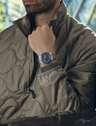 Angle shot of Victorinox 242042 Blue Dial Silver Stainless Steel Unisex Watch on white background