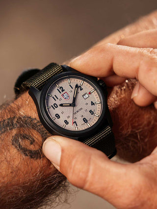 Angle shot of Luminox XL.1971.SET Grey Dial Green Silicone Unisex Watch on white background