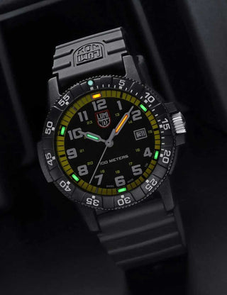 Angle shot of Luminox XS.0325 Yellow Dial Black Silicone Unisex Watch on white background