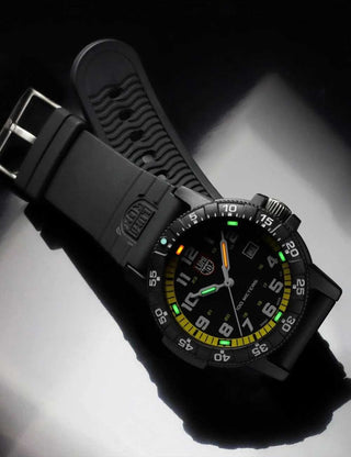 Angle shot of Luminox XS.0325 Yellow Dial Black Silicone Unisex Watch on white background