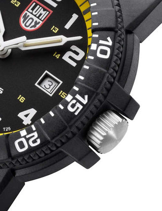 Angle shot of Luminox XS.0325 Yellow Dial Black Silicone Unisex Watch on white background