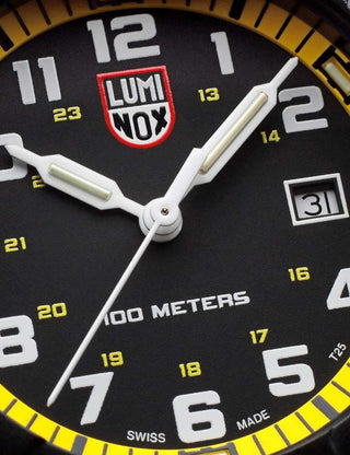 Angle shot of Luminox XS.0325 Yellow Dial Black Silicone Unisex Watch on white background