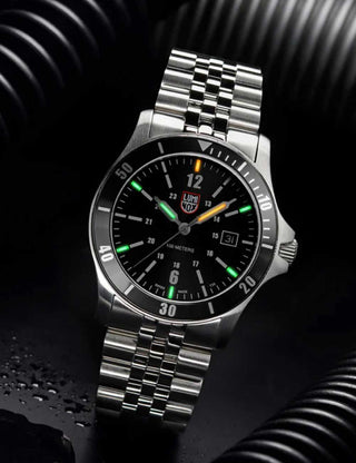Angle shot of Luminox XS.0911 Black Dial Silver Stainless Steel Unisex Watch on white background