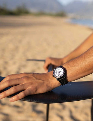 Angle shot of Luminox XS.3127M White Dial Black Strap Unisex Watch on white background